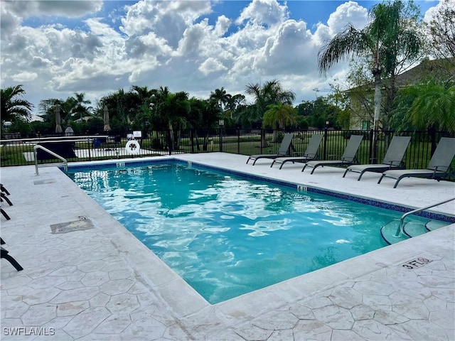 view of pool featuring a patio area