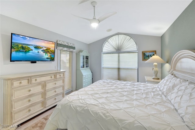 bedroom featuring lofted ceiling and ceiling fan