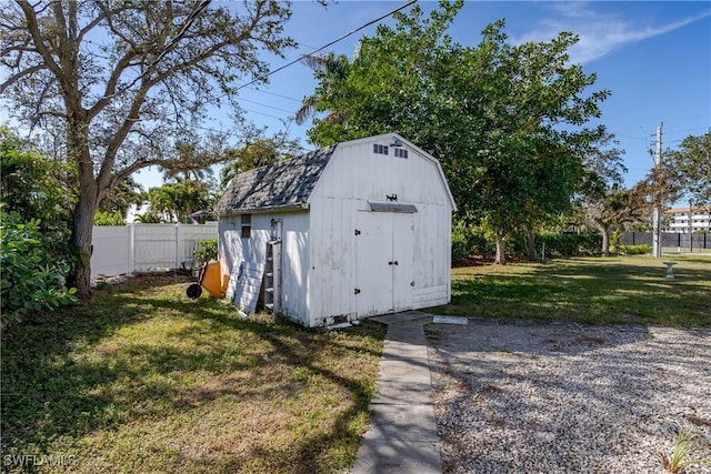 view of outdoor structure with a yard