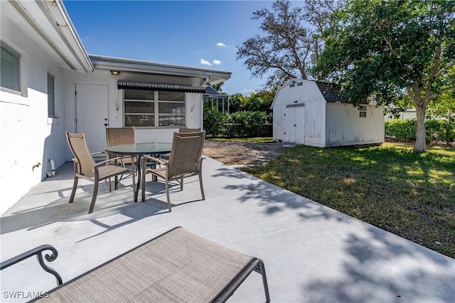 view of patio / terrace featuring a storage unit