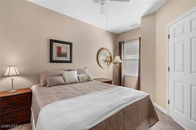 carpeted bedroom featuring ceiling fan