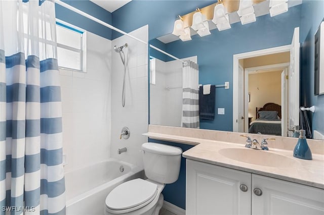 full bathroom featuring vanity, toilet, and shower / tub combo