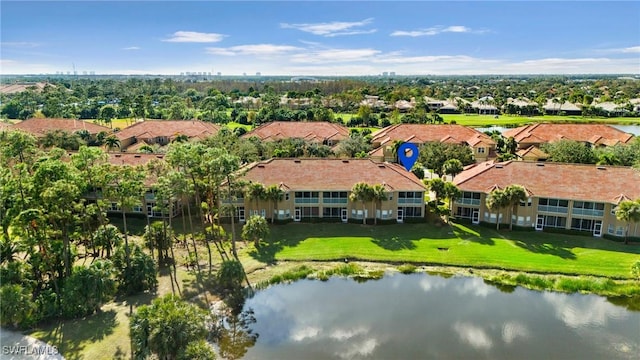 bird's eye view with a water view