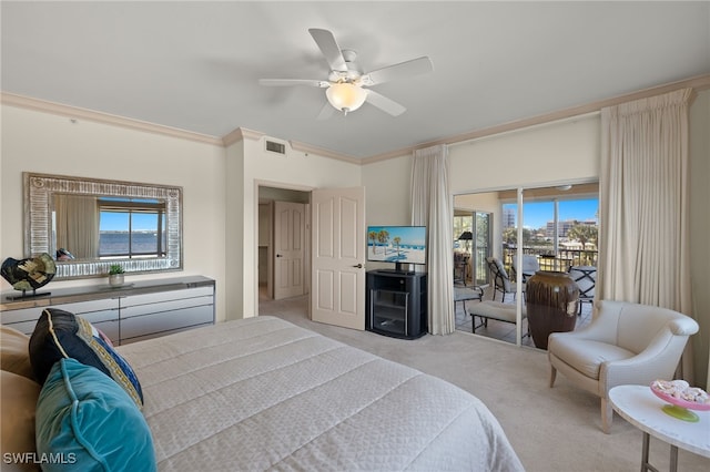 bedroom featuring crown molding, access to outside, light colored carpet, and ceiling fan