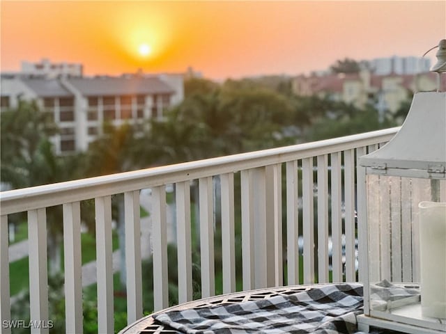 view of balcony at dusk