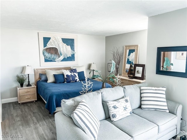 bedroom with hardwood / wood-style floors