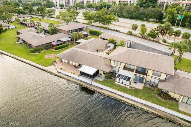 bird's eye view with a water view