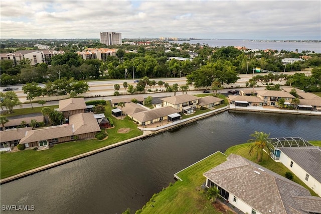 drone / aerial view with a water view