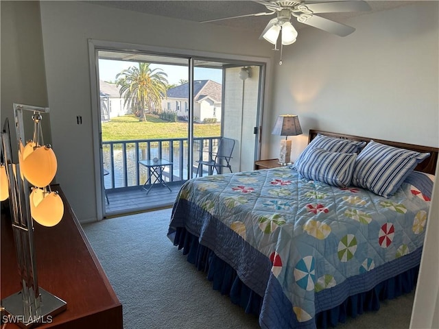 carpeted bedroom with access to outside