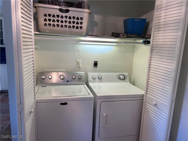 washroom with washer and clothes dryer