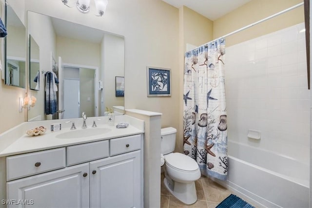 full bathroom with tile patterned floors, toilet, shower / tub combo, and vanity