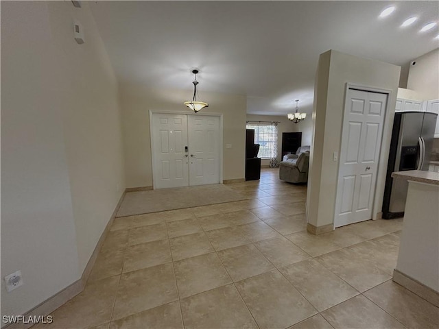 foyer with light tile patterned floors