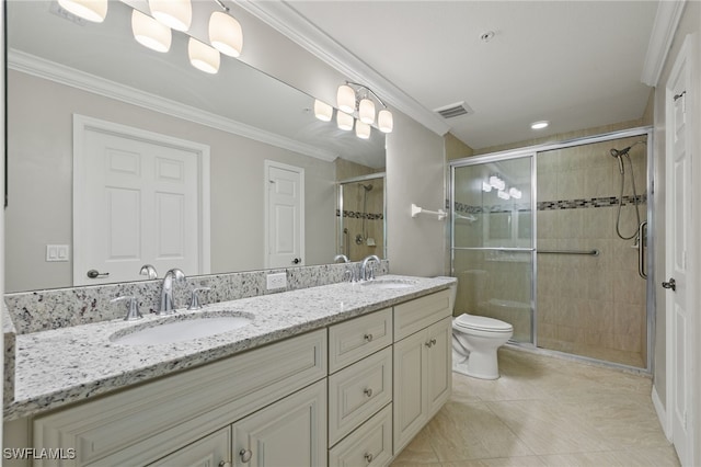 bathroom with crown molding, vanity, and an enclosed shower