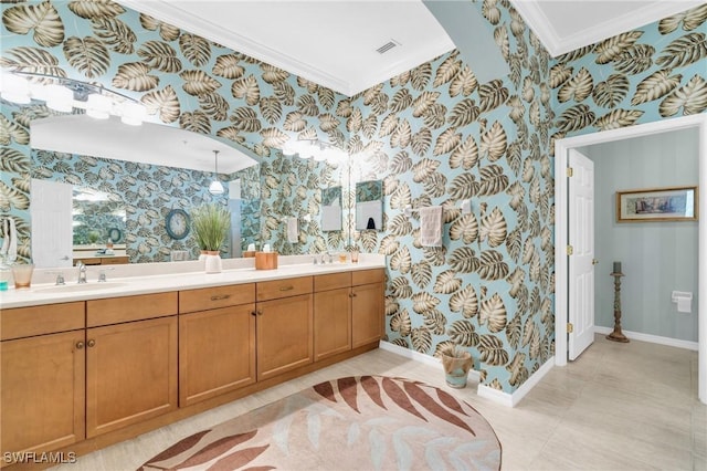 bathroom featuring vanity, tile patterned flooring, and crown molding