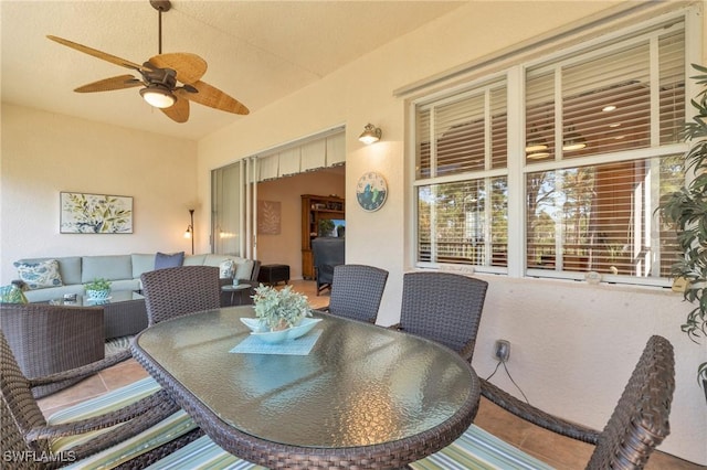 dining space featuring ceiling fan