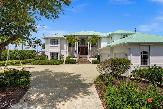 view of front of property with a garage