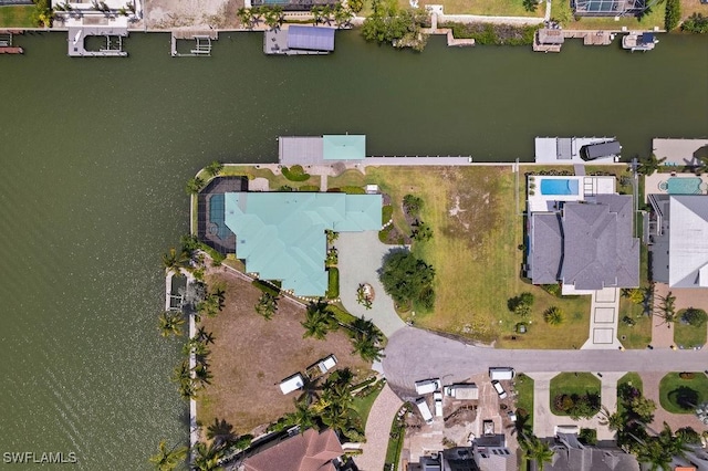 bird's eye view with a water view