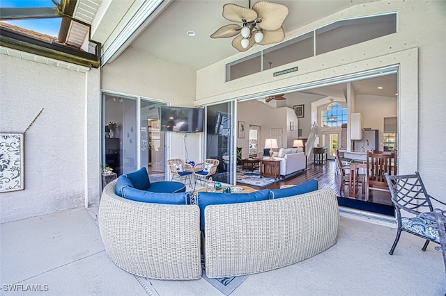 view of patio / terrace featuring outdoor lounge area and ceiling fan