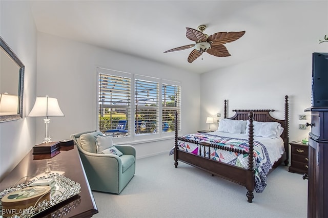 bedroom with ceiling fan and carpet flooring