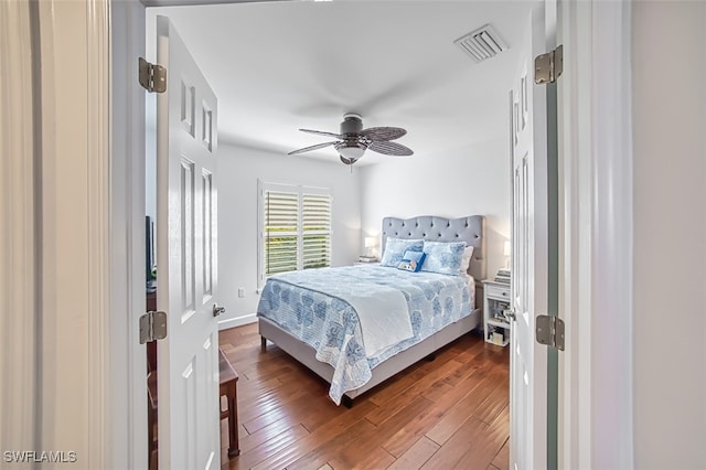 bedroom featuring ceiling fan and hardwood / wood-style floors