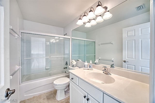 full bathroom with vanity, toilet, tile patterned flooring, and combined bath / shower with glass door