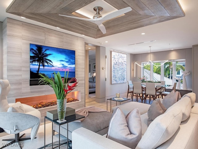 living room with a raised ceiling