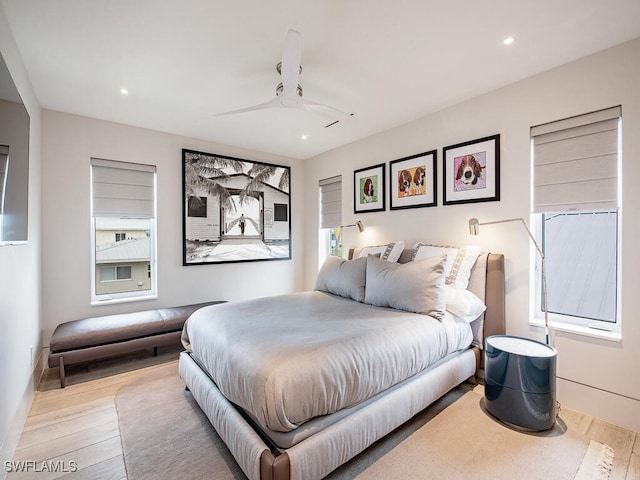 bedroom featuring ceiling fan and light hardwood / wood-style floors