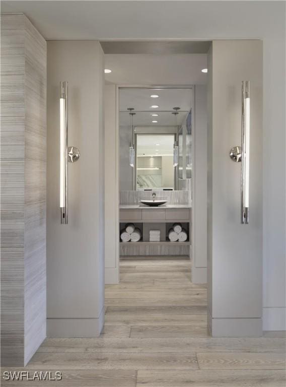 hallway with light wood-type flooring