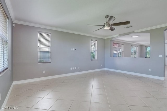 unfurnished room featuring crown molding, ceiling fan, and light tile patterned floors