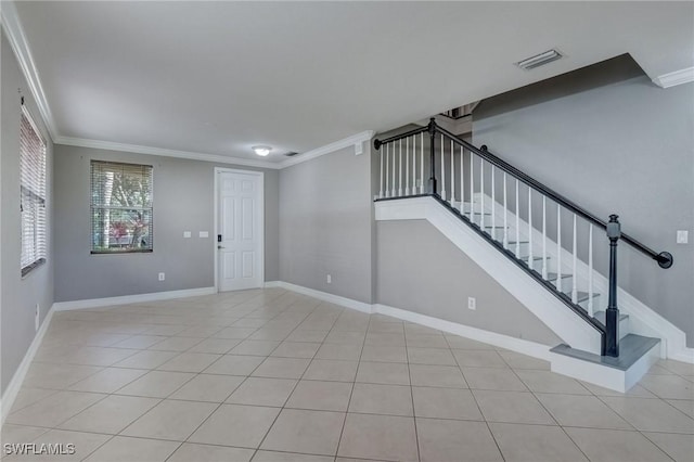 1654 Double Eagle Trl, Naples, FL 34120 - unfurnished living room featuring ornamental molding, stairs, baseboards, and light tile patterned floors