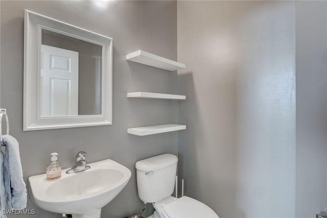 1654 Double Eagle Trl, Naples, FL 34120 - bathroom with a sink and toilet