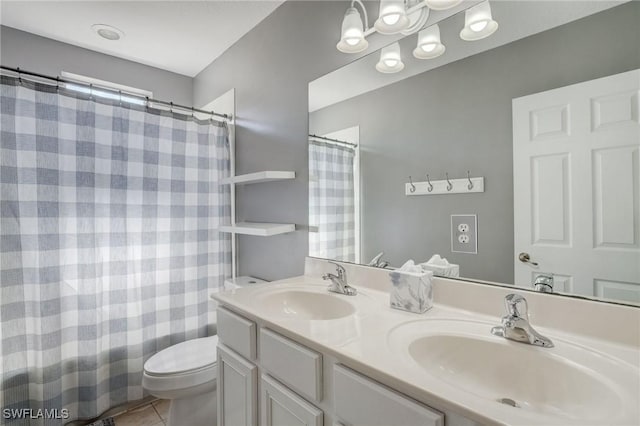 full bathroom featuring tile patterned flooring, vanity, shower / bath combination with curtain, and toilet