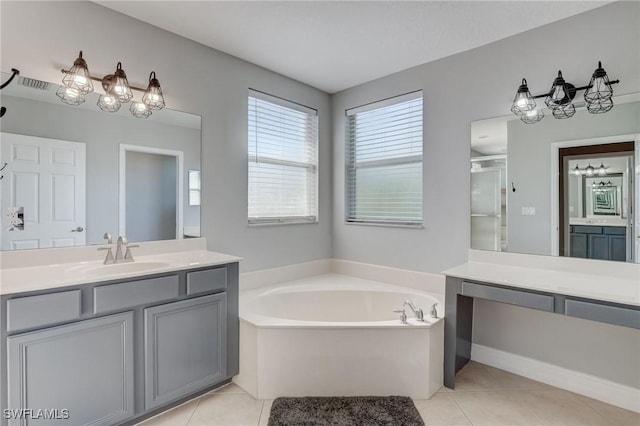 bathroom with vanity, independent shower and bath, and tile patterned flooring