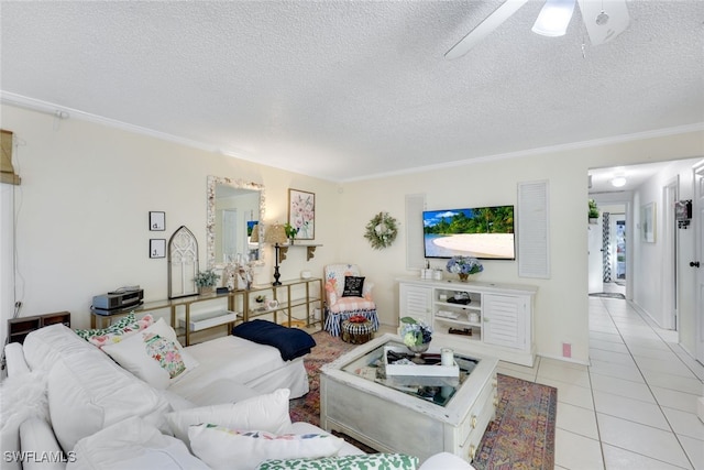 tiled living room with crown molding and a textured ceiling