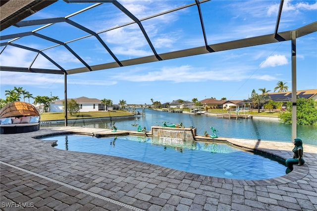 view of pool featuring a water view, a lanai, pool water feature, and a patio area