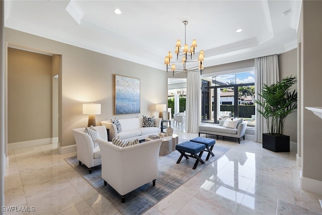 living room with ornamental molding, a raised ceiling, and a notable chandelier