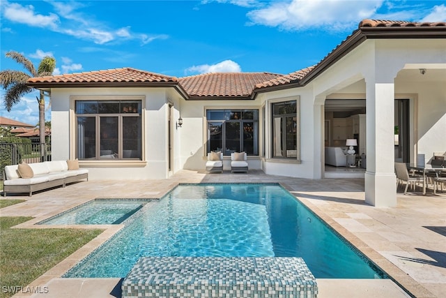 back of house with a fenced in pool, a patio area, and outdoor lounge area