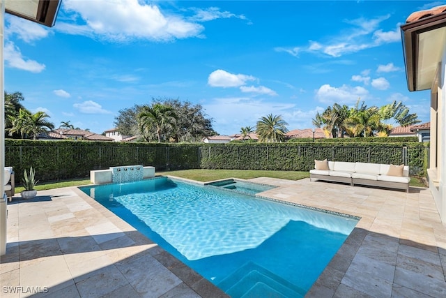 view of pool featuring an outdoor hangout area, a patio area, and an in ground hot tub