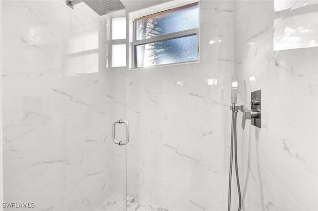 bathroom with an enclosed shower