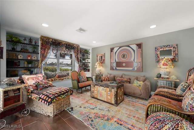 living area featuring tile patterned flooring