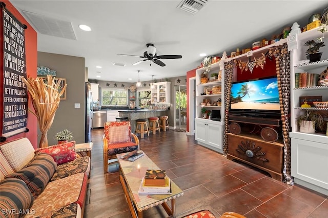 living room featuring ceiling fan