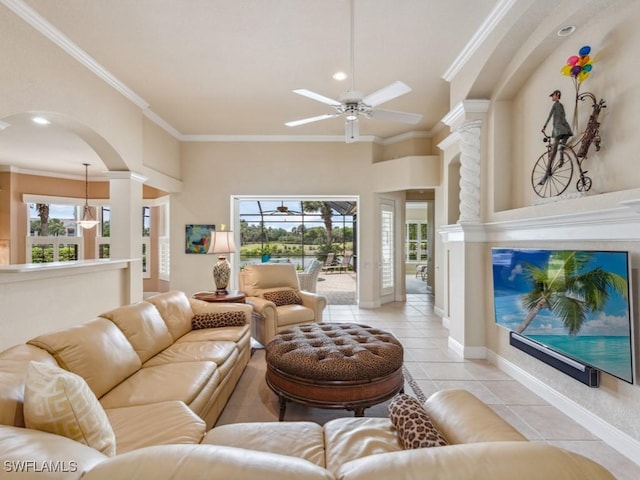 living room featuring crown molding, ceiling fan, and light tile patterned floors