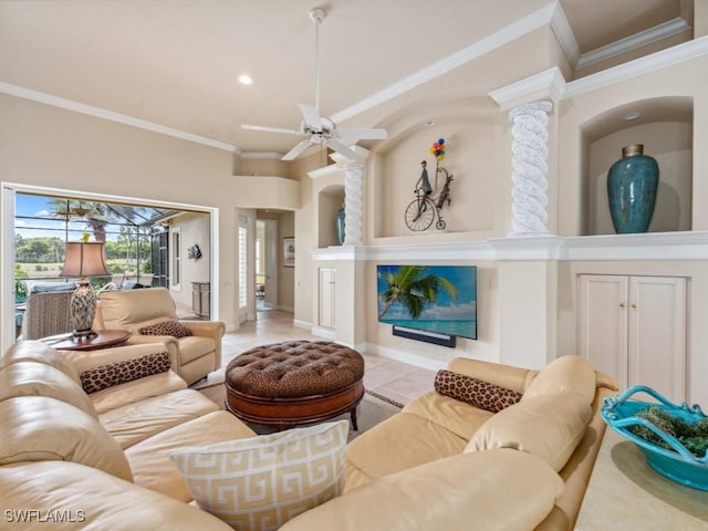 living room with light tile patterned flooring, ornamental molding, and ceiling fan