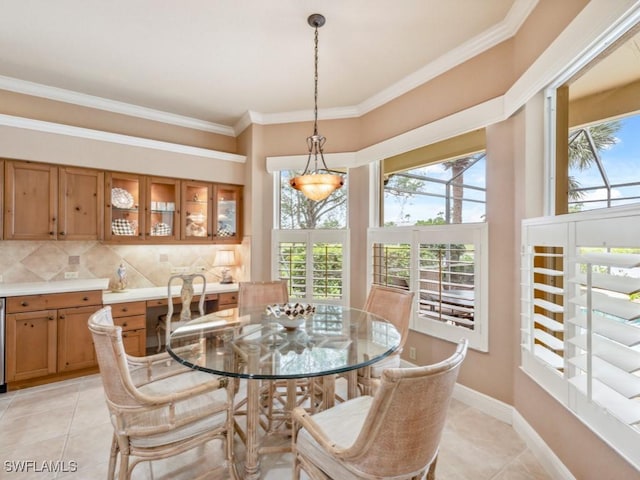 tiled dining room with ornamental molding