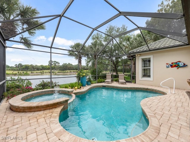 view of swimming pool featuring an in ground hot tub, a patio, glass enclosure, and a water view