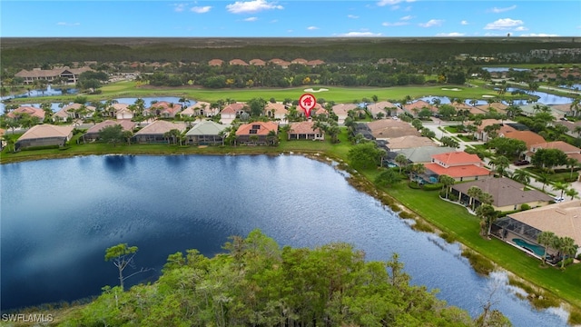 drone / aerial view with a water view