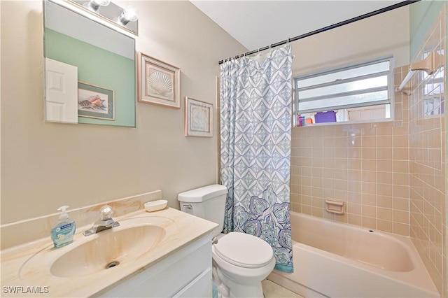 full bathroom featuring vanity, toilet, and shower / bath combo with shower curtain