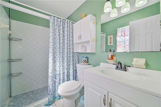 bathroom with walk in shower, vanity, and toilet