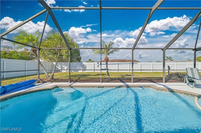 view of pool with a lanai