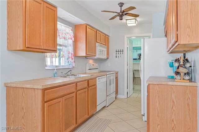 kitchen with ceiling fan, sink, light tile patterned flooring, and white appliances